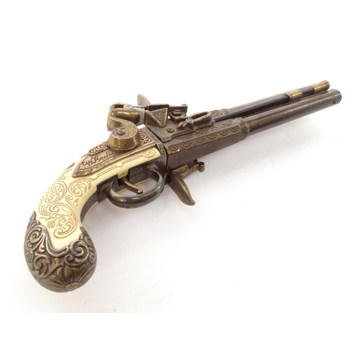 747 - Decorative flintlock pistol, 32cm long