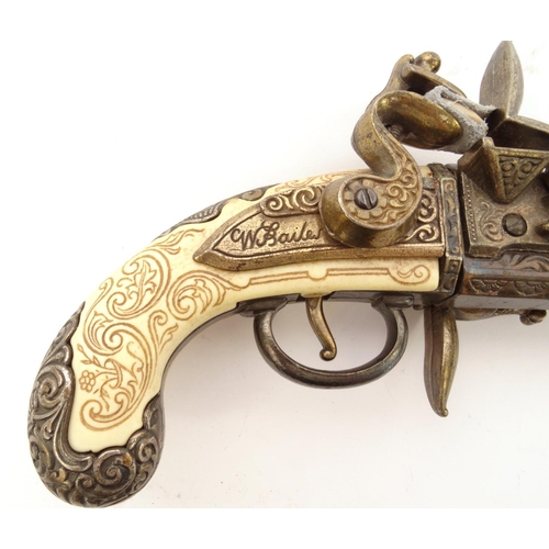 747 - Decorative flintlock pistol, 32cm long