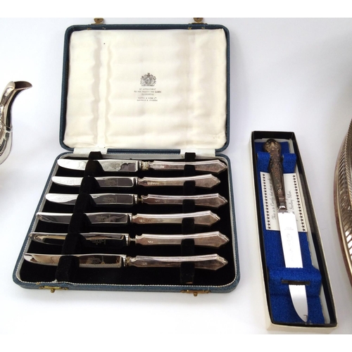 176 - Box of silver plated items including set of six silver handled butter knives, teapots, large oval tr... 
