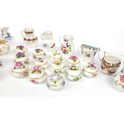 169 - Collection of miniature Royal Worcester jugs, flower displays and trinkets