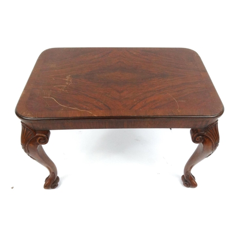105 - Carved walnut coffee table, 46cm high x 68cm wide x 45cm deep