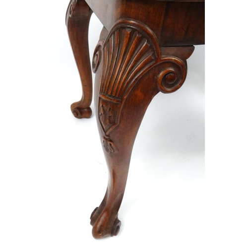 105 - Carved walnut coffee table, 46cm high x 68cm wide x 45cm deep