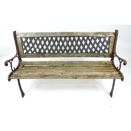 133 - Cast iron garden bench with wooden slats, 127cm long