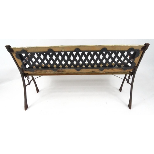133 - Cast iron garden bench with wooden slats, 127cm long
