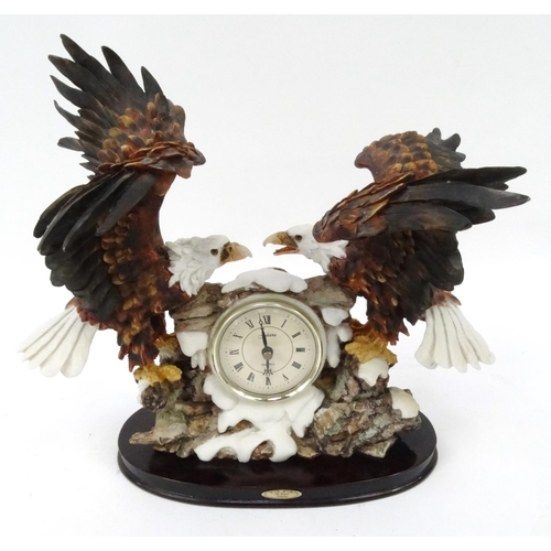 61 - The Jeweller Collection eagle desk clock, 33cm high