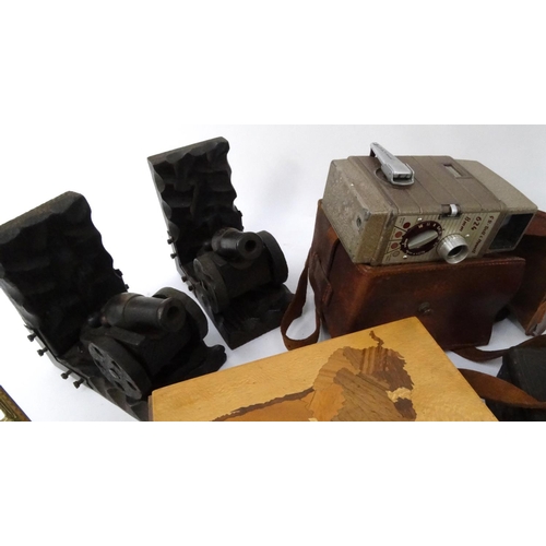 232 - Box of wooden and metal items including decanters, claret jug, glass cruets, vintage camera, carved ... 