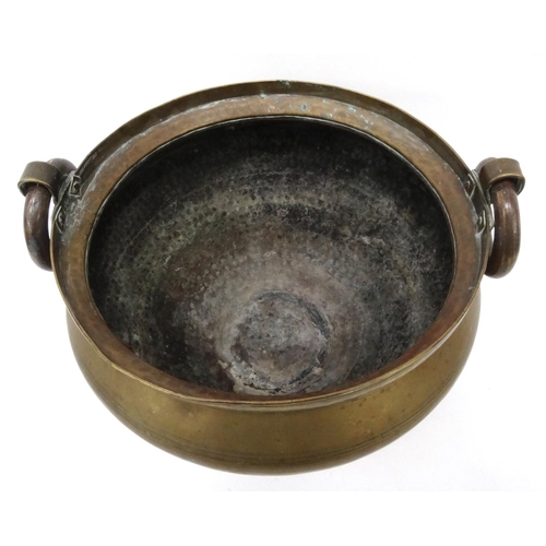 255 - Large brass vessel with ring handles, 40cm diameter