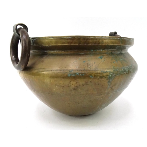 255 - Large brass vessel with ring handles, 40cm diameter