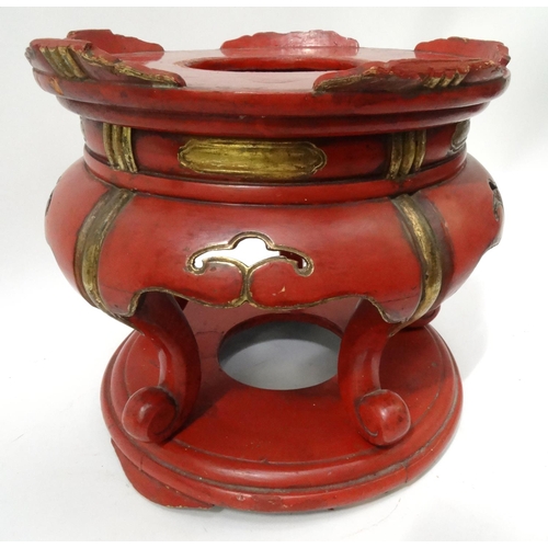 64 - Oriental red lacquered wood jardinière stand, 32cm high x 33cm diameter