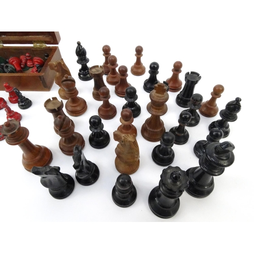 629 - Part lead chess set and a mixed wood chess set including Staunton pieces