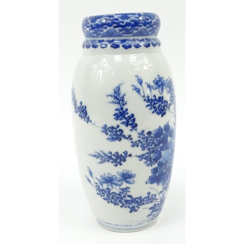 182 - Oriental porcelain blue and white vase decorated with flowers, 25cm high