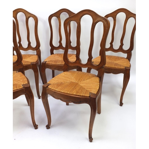 17 - Set of six oak dining chairs with rush seats
