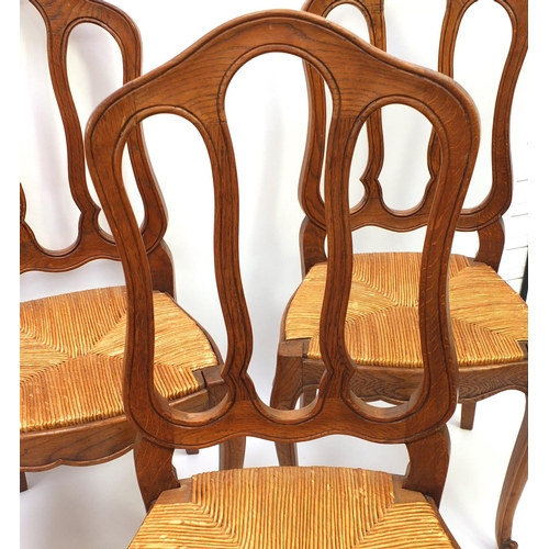 17 - Set of six oak dining chairs with rush seats