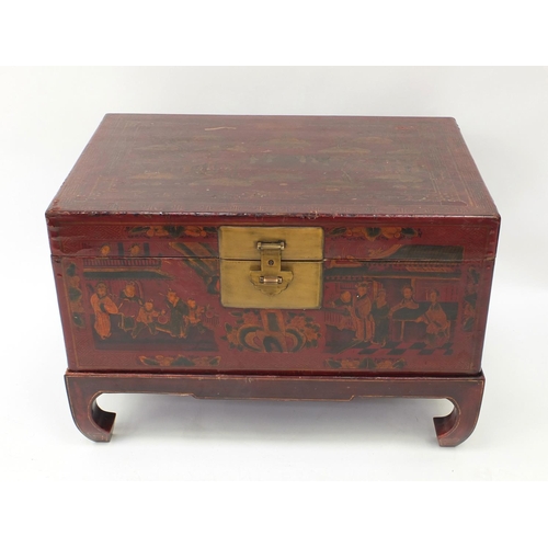 35 - Oriental red lacquered chest on stand decorated with figures in a landscape, 50cm high x 73cm wide x... 
