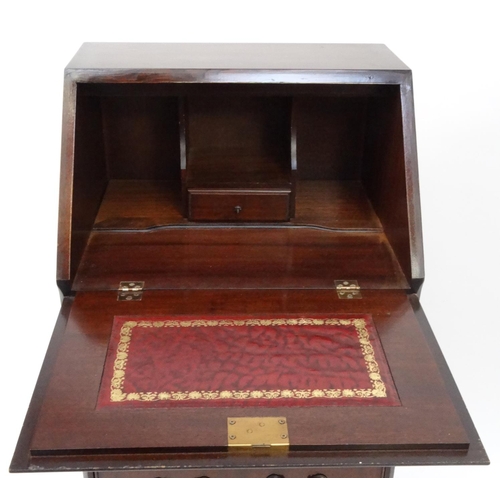 62 - Inlaid mahogany bureau fitted with a fall above four drawers, 95cm high x 51cm wide x 41cm deep