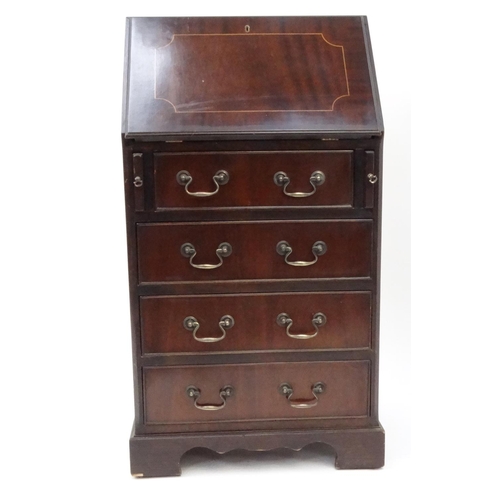 62 - Inlaid mahogany bureau fitted with a fall above four drawers, 95cm high x 51cm wide x 41cm deep