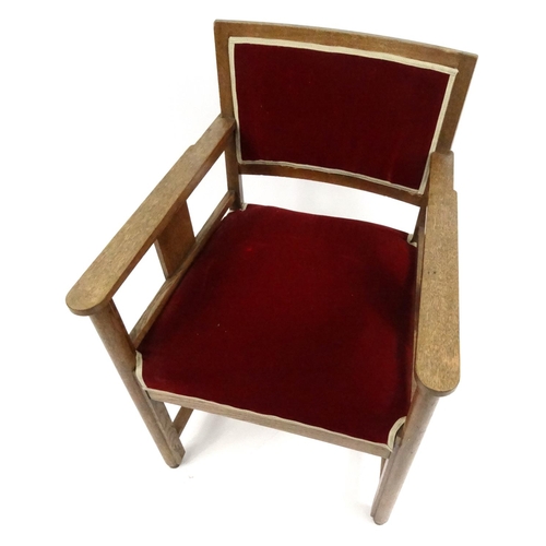 99 - Oak framed armchair with red upholstery