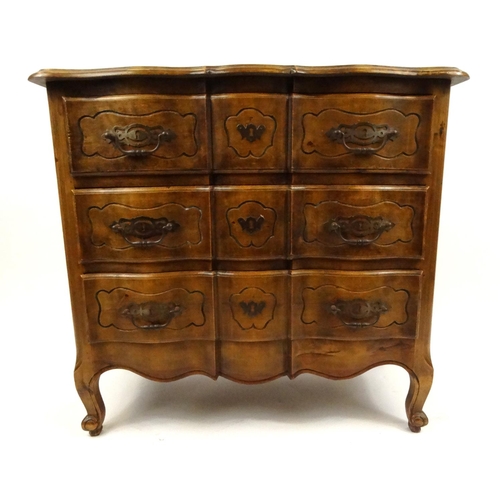 14 - Carved oak three drawer serpentine front chest, 85cm high x 90cm wide x 44cm deep