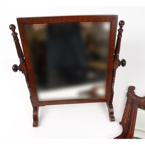 92 - Mahogany swing mirror and an inlaid mahogany bevel edged mirror