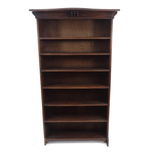 50 - Oak Liberty style Arts and Crafts open bookcase fitted with seven shelves, 185cm high x 107cm wide x... 