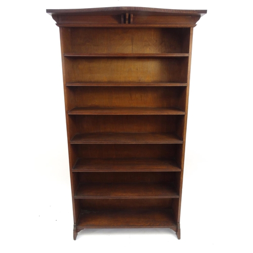 51 - Oak Liberty style Arts and Crafts open bookcase fitted with seven shelves, 185cm high x 107cm wide x... 