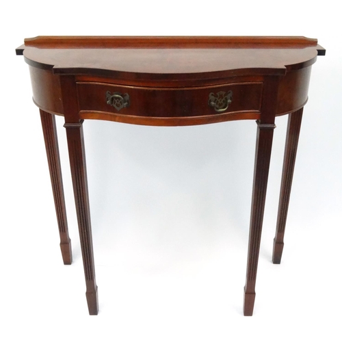 41 - Yew serpentine fronted hall table with a drawer, 75cm high x 84cm wide x 37cm deep