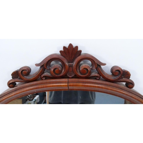 33 - Victorian mahogany dome top mirror, 136cm high