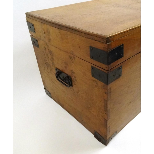 11 - Metal bound walnut travelling trunk with lift out tray, 49cm high x 91cm wide x 51cm deep