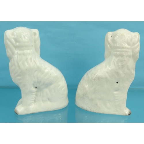 198 - Pair of Victorian Staffordshire seated spaniels, 24cm high