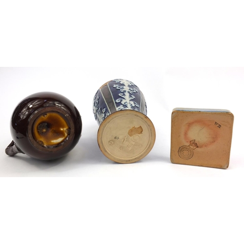 153 - Three Royal Doulton stoneware items comprising Art Nouveau vase, ashtray and a Kings ware jug decora... 