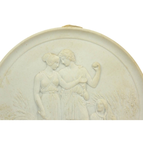 147 - Circular Royal Copenhagen Parian ware plaque decorated with a harvesting scene, 14cm diameter