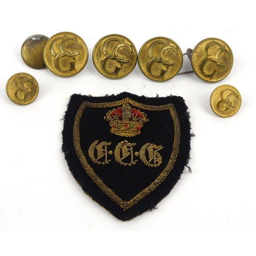 740 - Selection of German military brass badges and a patch for The German Control Commission, the largest... 