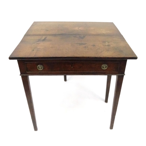 11 - Early 19th century oak tea table with folding top above a drawer on tapering legs, 74cm high x 67cm ... 