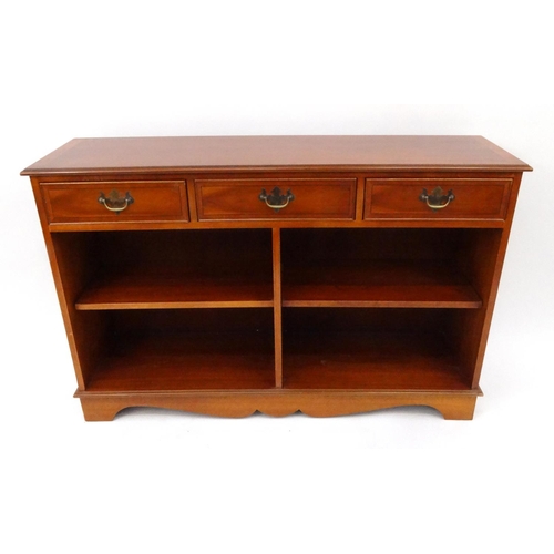 34 - Inlaid yew wood dwarf bookcase fitted with three drawers above open shelves, 80cm high x 121cm wide ... 
