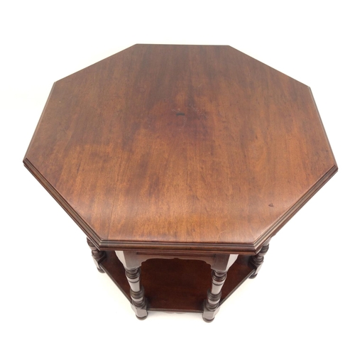 49 - Inlaid Arts & Crafts mahogany octagonal occasional table inlaid with stylized flowers, 77cm high