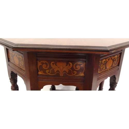 49 - Inlaid Arts & Crafts mahogany octagonal occasional table inlaid with stylized flowers, 77cm high