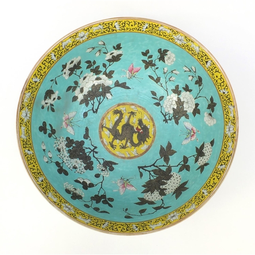 560 - Large oriental Chinese porcelain punch bowl hand painted with dragons and flowers, character mark to... 