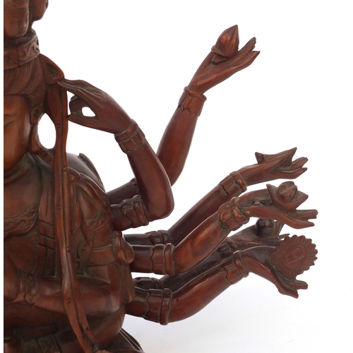 654 - Oriental Chinese Tibetan wooden Buddha, with detachable arms, 24cm high