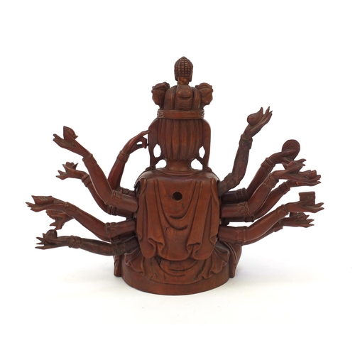 654 - Oriental Chinese Tibetan wooden Buddha, with detachable arms, 24cm high