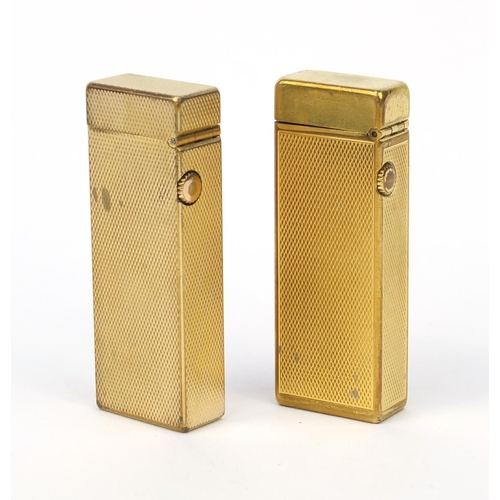 122 - Boxed gold plated Dunhill lighter with engine turned decoration, together with an unboxed example, b... 