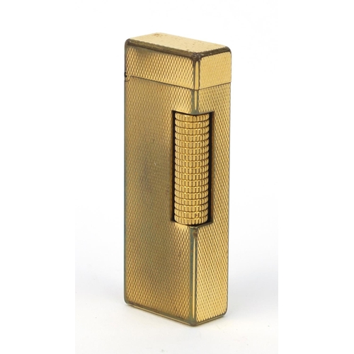 125 - Gold plated Dunhill lighter with engine turned decoration, 6.5cm high