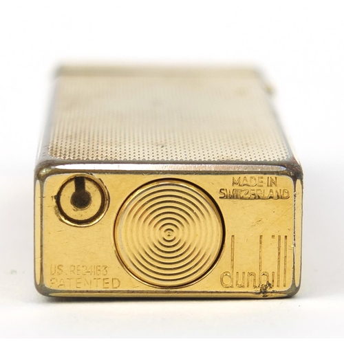125 - Gold plated Dunhill lighter with engine turned decoration, 6.5cm high