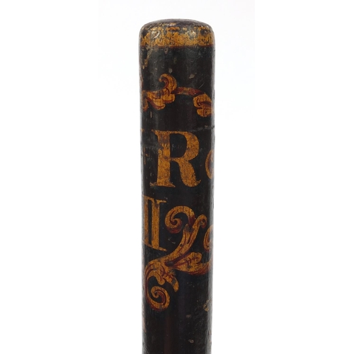 55 - Three hand painted wooden truncheons - one with a coat of arms, the largest 46cm long