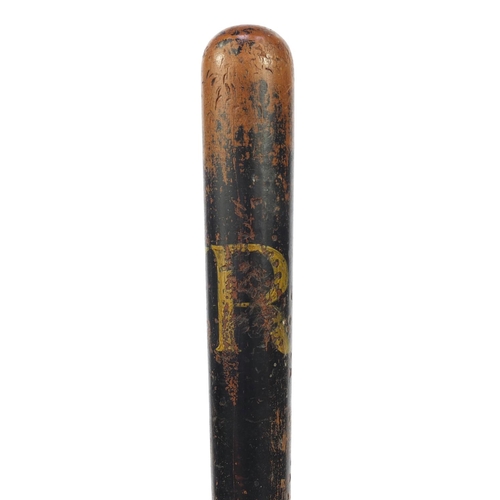 55 - Three hand painted wooden truncheons - one with a coat of arms, the largest 46cm long