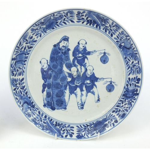 543 - Oriental Chinese porcelain plate hand painted with acrobats and dragons, together with a similar pla... 