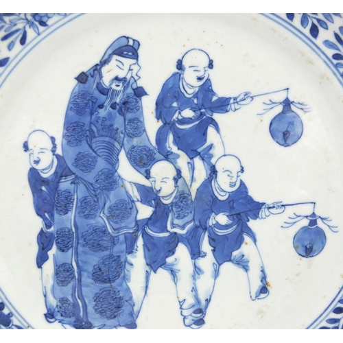 543 - Oriental Chinese porcelain plate hand painted with acrobats and dragons, together with a similar pla... 