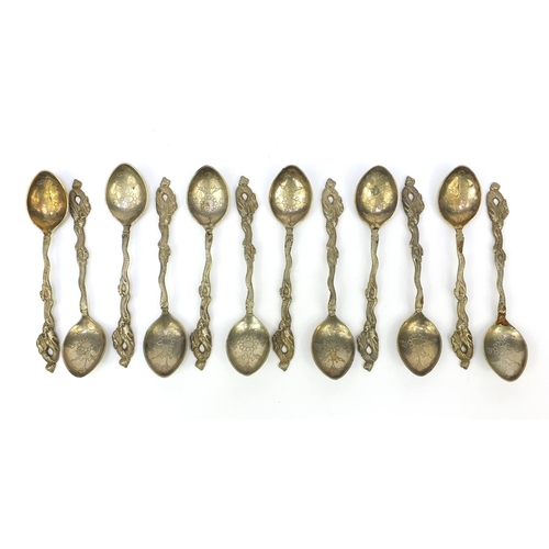 647 - Set of 12 oriental Chinese white metal teaspoons with dragon terminals, stamped 'Shanghai 900' to th... 