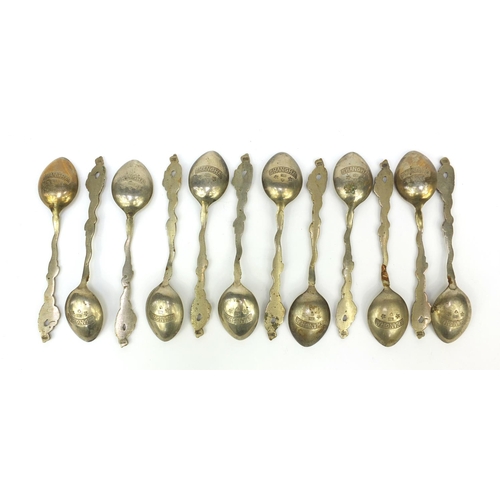 647 - Set of 12 oriental Chinese white metal teaspoons with dragon terminals, stamped 'Shanghai 900' to th... 