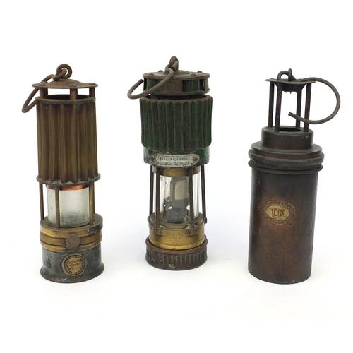 186 - Three miner's lamps including Turquand & Q Ltd example, the largest 28cm high