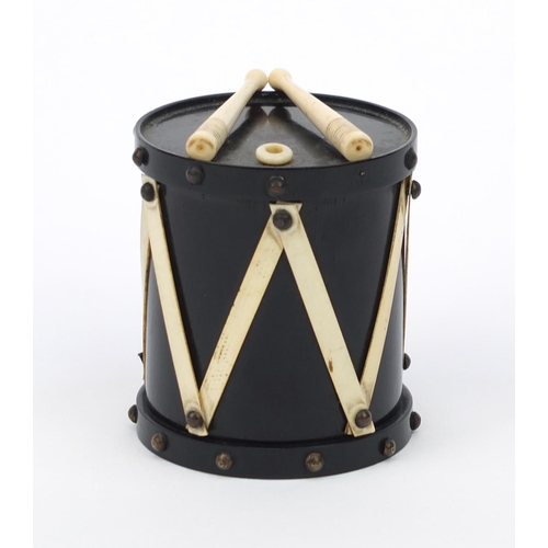 117 - 19th Century wooden and ivory Go-To-Bed match striker in the form of a drum, 6cm high